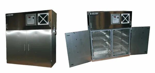 Stainless steel industrial sterilizer, open and closed.