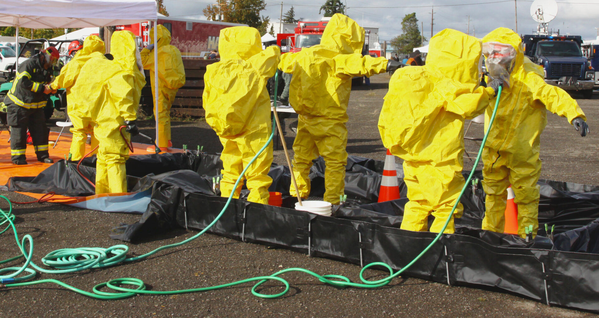 Hazmat team cleaning up spill.