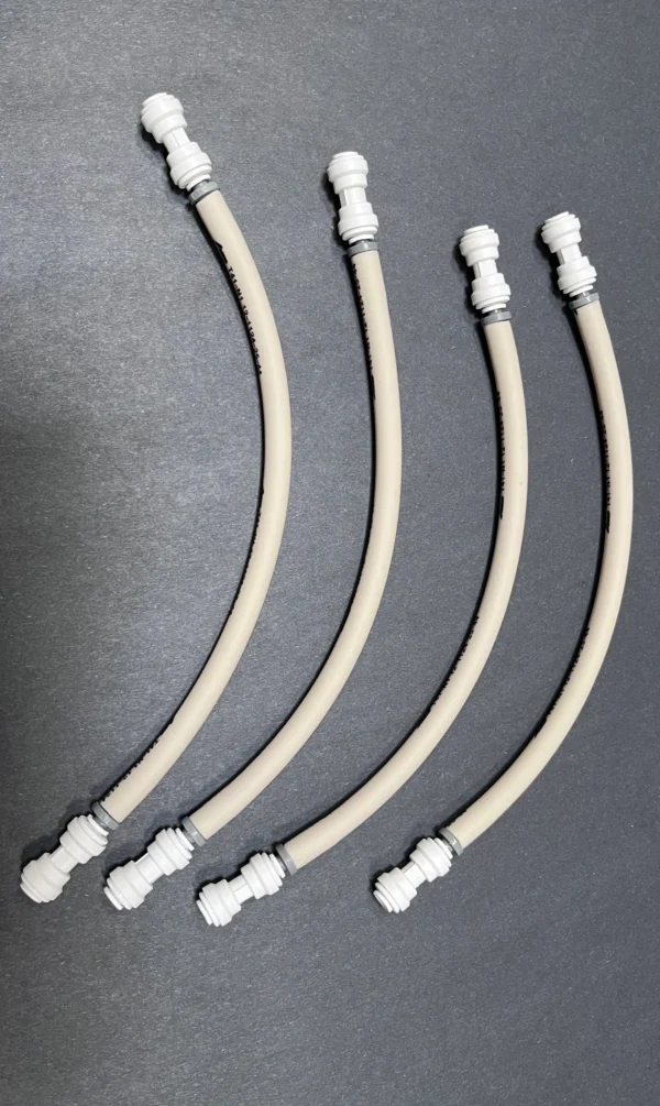 Four beige water tubes with connectors.